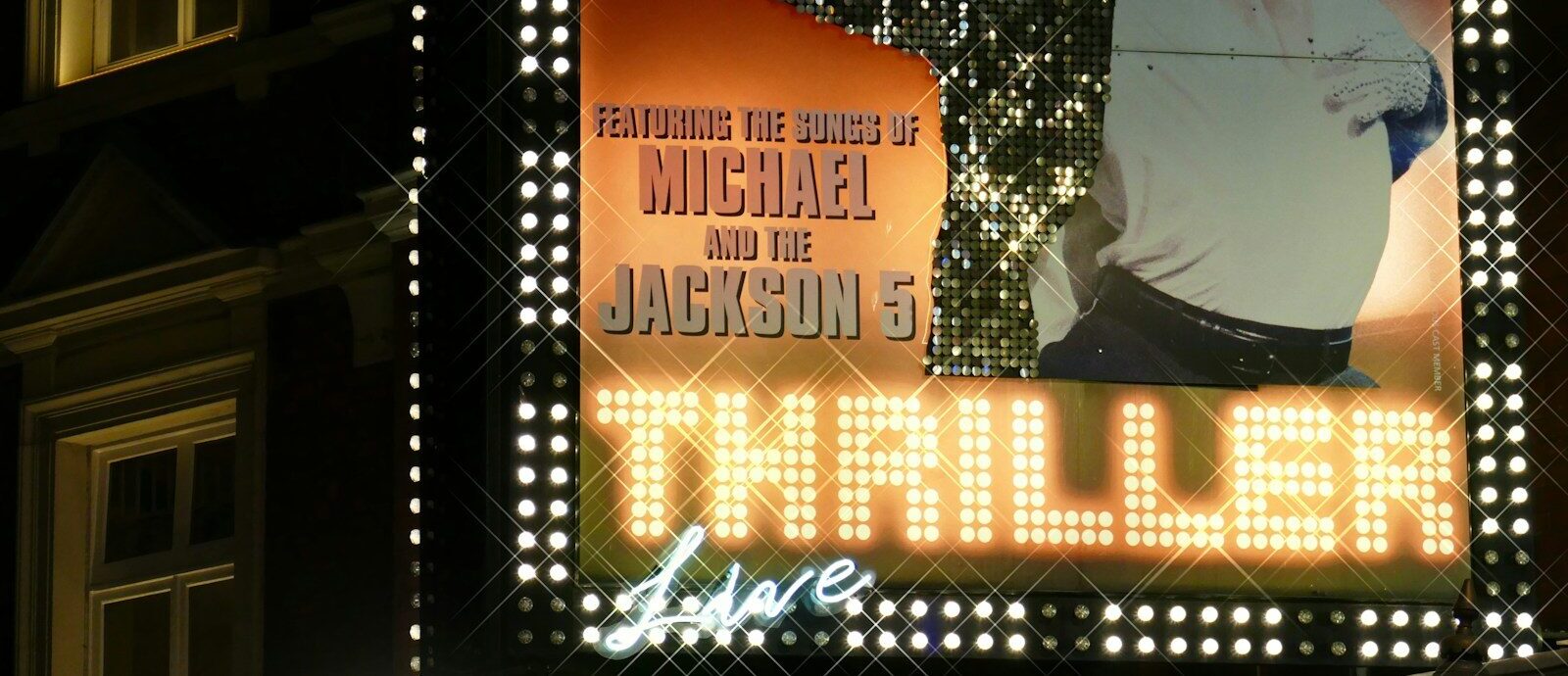 Michael Jackson 5 billboard during nighttime